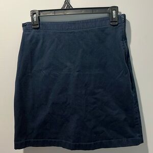 navy blue skirt with built in shorts and adjustable waistband with zipper